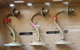 Early-to-mid 20th century French-style brass wall sconces featuring ornate leaf arm designs. (3)