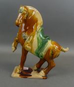 20th century vintage Tang dynasty style war horse figurine, character impressed to base. (H: 32cm)