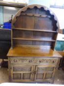 Dutch style oak dresser with 2 doors and 2 drawers to the base with plate rack and cup hooks