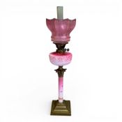 19th century Victorian oil lamp, pink enamelled glass column & reservoir on brass base, overall