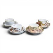 A collection of 19th century porcelain tea cups and saucers in various patterns from different