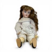 French Bébé Jumeau Doll recognised for their realistic hand cut glass eyes and finely modelled