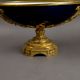 An oval porcelain serving bowl with cobalt exterior, with ornate gilt metal mounts, handle to handle - Image 4 of 8