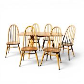 Ercol Windsor drop-leaf dining table, model no.383, together with six dining chairs (gold label). (