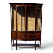 An Edwardian mahogany Sheraton style breakfront two door display cabinet, H186cm x W128cm x D39cm.