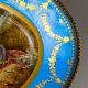 A large oval dish ornately decorated in the manner of Sevres porcelain, featuring a male and three - Image 5 of 9