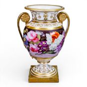 19th century porcelain twin-handled vase, featuring floral bouquet painted on a pink and brown