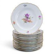 KPM The Royal Porcelain Factory In Berlin, A Set Of Twelve Dinner Plates, Hand Painted Depicting