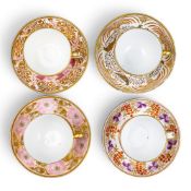 A collection of 19th century porcelain tea cups and saucers in various patterns from different