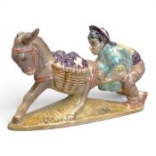 Beswick figure of Spaniard pushing a donkey model no.1224. approx. height 10cm, factory mark to