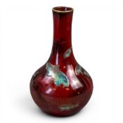Bernard Moore Flambe bud vase, decorated with blue and gold fish, gilded backstamp, h.15cm.