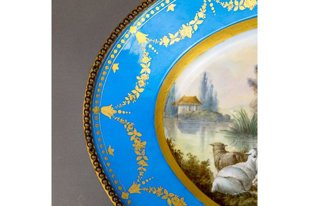 A large oval dish ornately decorated in the manner of Sevres porcelain, featuring a male and three - Image 4 of 9