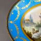 A large oval dish ornately decorated in the manner of Sevres porcelain, featuring a male and three - Image 4 of 9