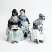 Royal Copenhagen Amager Girls Reading No:1395 together with Amager Girl Darning Socks No:-1314.