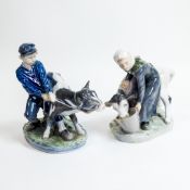 Royal Copenhagen Porcelain character figures to include:- Woman feeding a Calf No:779 together