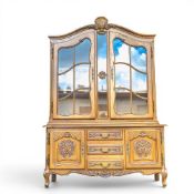 Large French oak Louis XV style display cabinet. Heavily carved details, 3 central drawers, 2