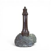 Cornish Serpentine stone lighthouse sculpture, carved from Serpentine stone with red tones with