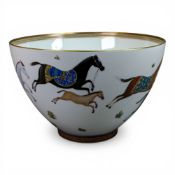 Hermés Cheval d'Orient porcelain footed punch bowl, featuring decorative horses and gold