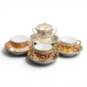 A collection of 19th century porcelain tea cups and saucers, also includes a lidded teacup, in