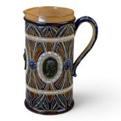 A Doulton Lambeth jug c1880, with cartouches against a scrolled ground by Frank Butler, approx.