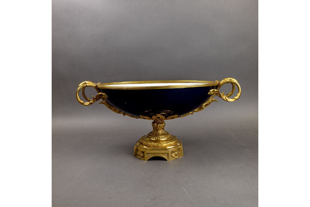 An oval porcelain serving bowl with cobalt exterior, with ornate gilt metal mounts, handle to handle - Image 2 of 8