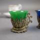 A group of five cups & saucers from various manufacturers, to include a Derby cup & saucer decorated - Image 7 of 7