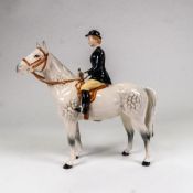 Beswick model of Huntswoman mounted on dapple grey horse, model 1730, h.21.5cm.