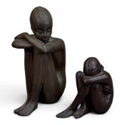 Deborah Scaldwell Moody (British 1960), a bronze sculpture of a seated nude woman with arms