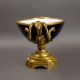 An oval porcelain serving bowl with cobalt exterior, with ornate gilt metal mounts, handle to handle - Image 6 of 8