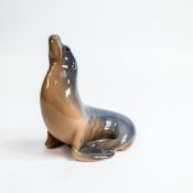 Royal Copenhagen Porcelain figure of a Sealion No:1441 designed by Theodor Madsen. H:-13cm