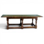 Large oak Jacobean style refectory table. Large turned legs with stretcher base, removable top