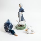 Royal Copenhagen Porcelain figures to include:- Character figure of woman in a headscarf and apron