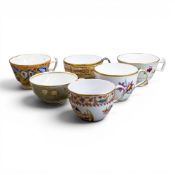 A collection of 19th century porcelain tea cups in various patterns from different manufacturers,