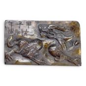 Carved stone Chinese dragon panel / tablet signed, 12.5cm x 7.2cm. Some minor damages to corners.
