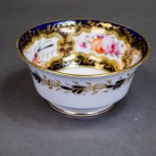 Early 19th century Coalport slop bowl, featuring cobalt blue underglaze, reserves decorated with