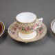 A group of five cups & saucers from various manufacturers, to include a Derby cup & saucer decorated - Image 4 of 7