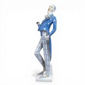 Amphora character figurine, c.1910, depicting a dandy gentleman in a pleading pose, wearing light