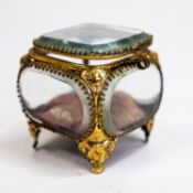 19th century French gilt brass and bevelled glass footed jewellery casket, with tufted red silk