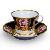 Early 19th century Armorial Chamberlain Worcester tea cup and saucer, featuring a rich cobalt blue