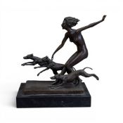 After Josef Lorenzl (Austrian 1892-1950), a bronze sculpture of a nude woman with three dogs, on