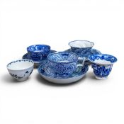 A small collection of 18th/19th century blue & white tea bowls, saucers and a cup and saucer, one