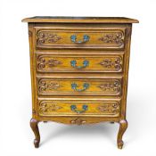 French style oak chest of 4 drawers. Heavily carved with brass hardware on Cabriole legs. H82cm x