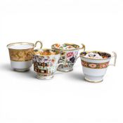 Early 19th century Spode porcelain coffee cups in various patterns including Imari style patterns