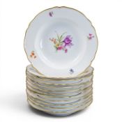KPM The Royal Porcelain Factory in Berlin, a set of twelve dessert plates, hand painted, depicting