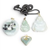 4 x 14ct gold mounted jade (or similar material) pendants.