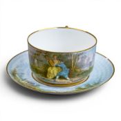 A Sevres cup & saucer, decorated with a male and female in a woodland scene, factory mark to base