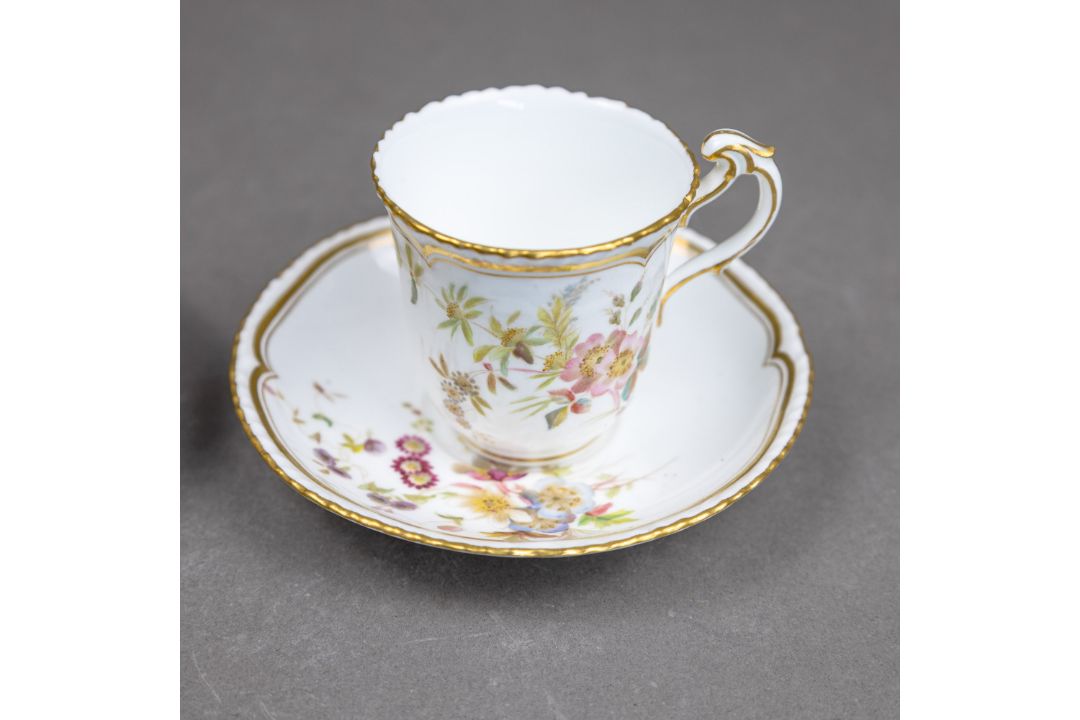 A group of five cups & saucers from various manufacturers, to include a Derby cup & saucer decorated - Image 5 of 7