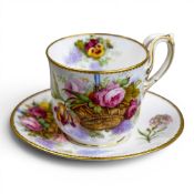 A Copelands cup & saucer with a strap handle, decorated in a floral design, factory mark to base.