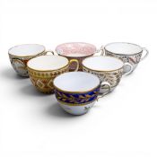 A collection of 19th century porcelain tea cups in various patterns from different manufacturers