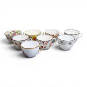 A collection of 19th century porcelain tea cups in various patterns from different manufacturers,